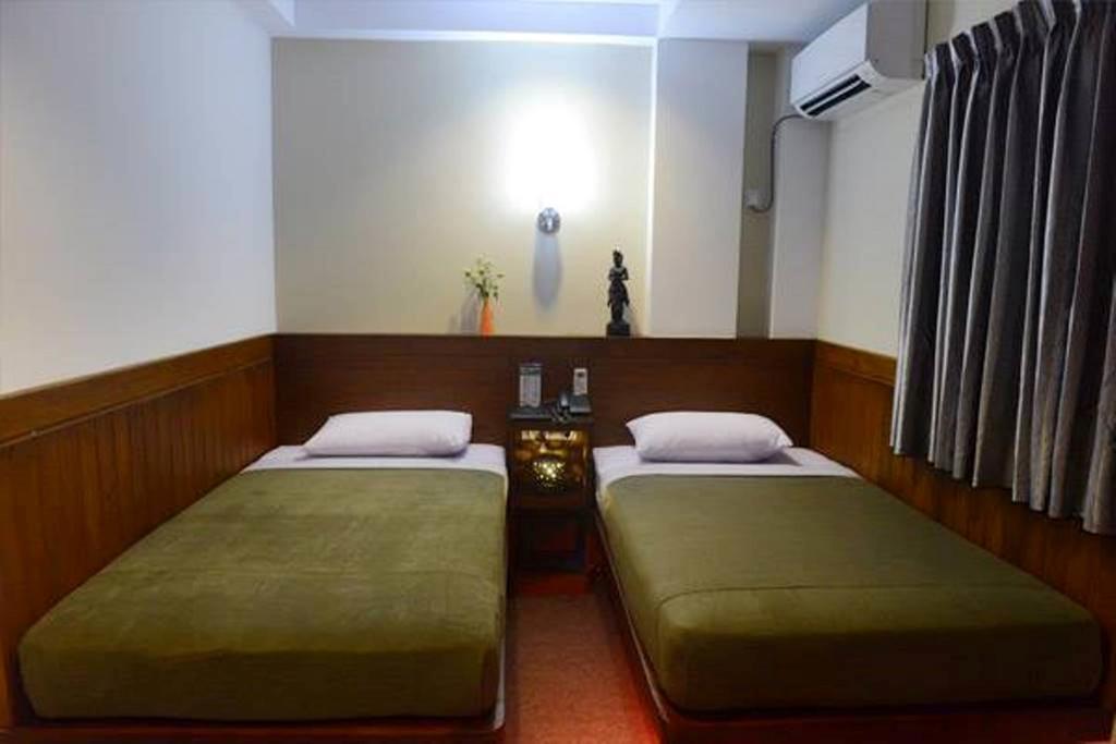 Green Paradise Hotel Yangon Zimmer foto